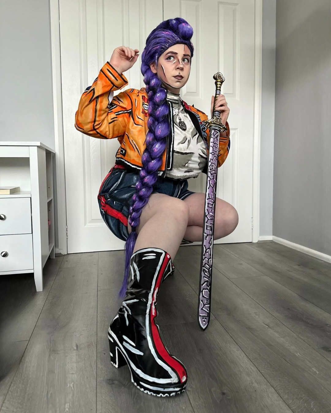 Image of Georgia Dyer cosplaying as celshaded Rumi from Kpop Demon Hunters