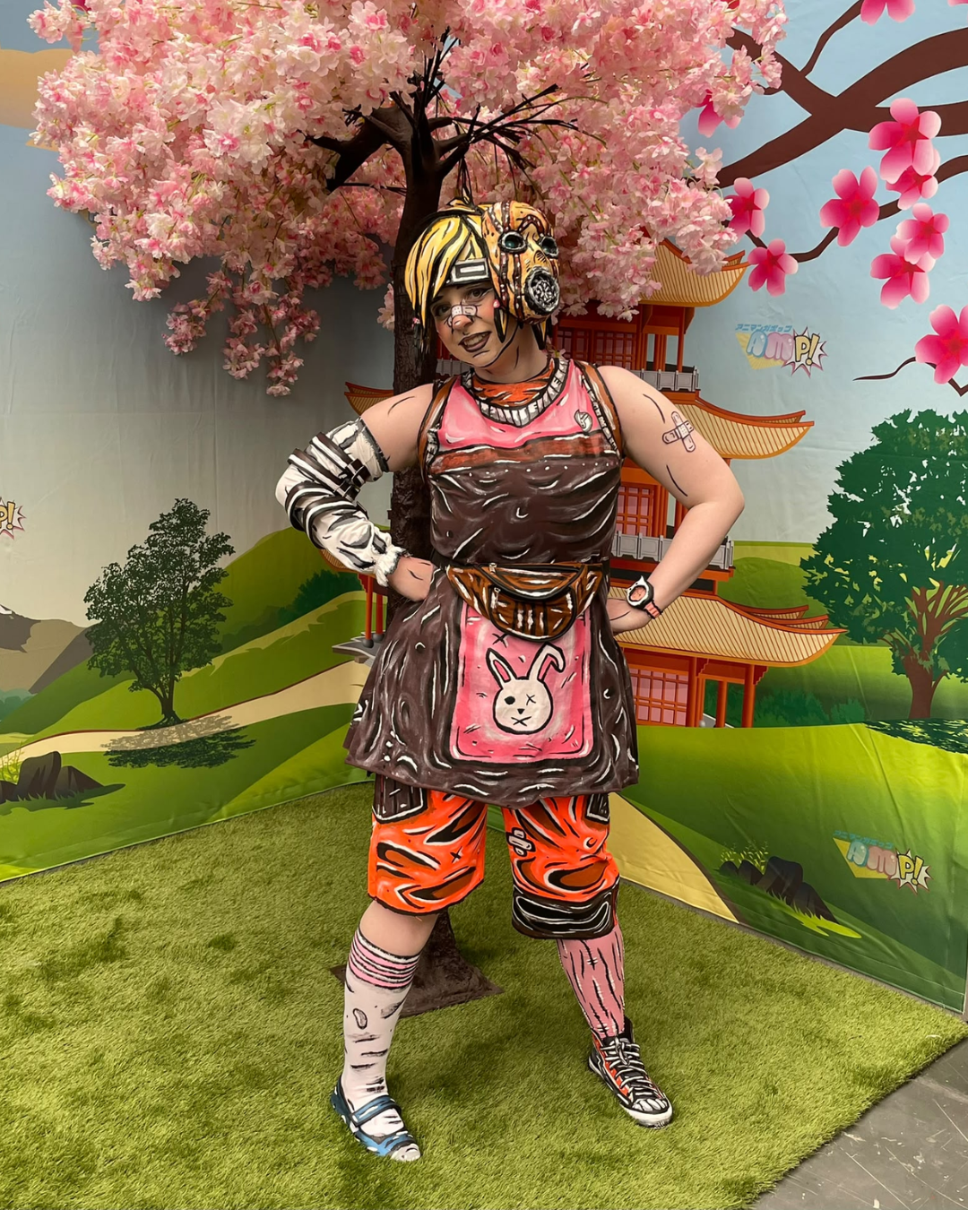 Celshaded Tiny Tina cosplayer with cherry blossom tree